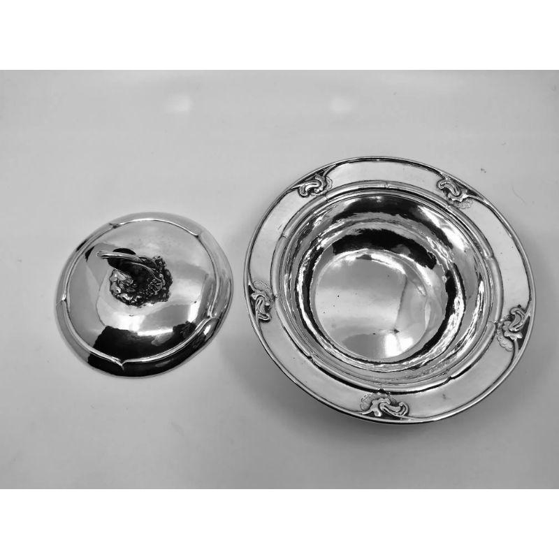 Grape design Georg Jensen sterling silver lidded dish with five floral motifs, design #228B by Georg Jensen from circa 1917. A wonderfully functional piece that can also be used as a decorative piece.

Additional information:
Material: Sterling