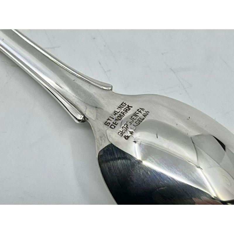 A Georg Jensen sterling silver slender grapefruit spoon, item #074 in the Lily of the Valley pattern, design #1 by Georg Jensen from 1913. This pattern also called “Rose”, the Danish name is “Liljekonval”.

Additional information:
Material: Sterling