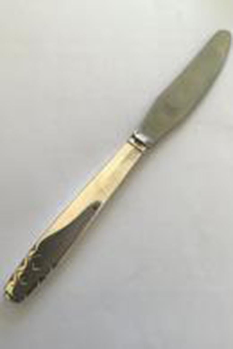 Georg Jensen sterling silver Mayan dinner knife no 014 (Long handle) 

Measures 23 cm(9 1/16 in).
