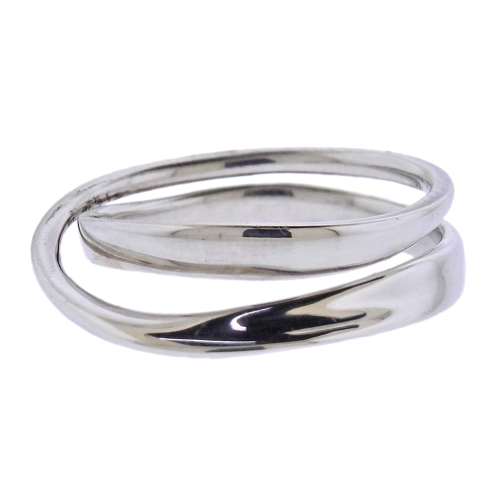 Brand new Georg Jensen sterling silver Moebius ring #369. Ring measures 3mm at the widest point and 1mm at the most narrow. Available in sizes: 51,52,54,55. Model#3552340. Marked: GJ, 925 S,Torun, 369. Weight is 3.0 grams.
