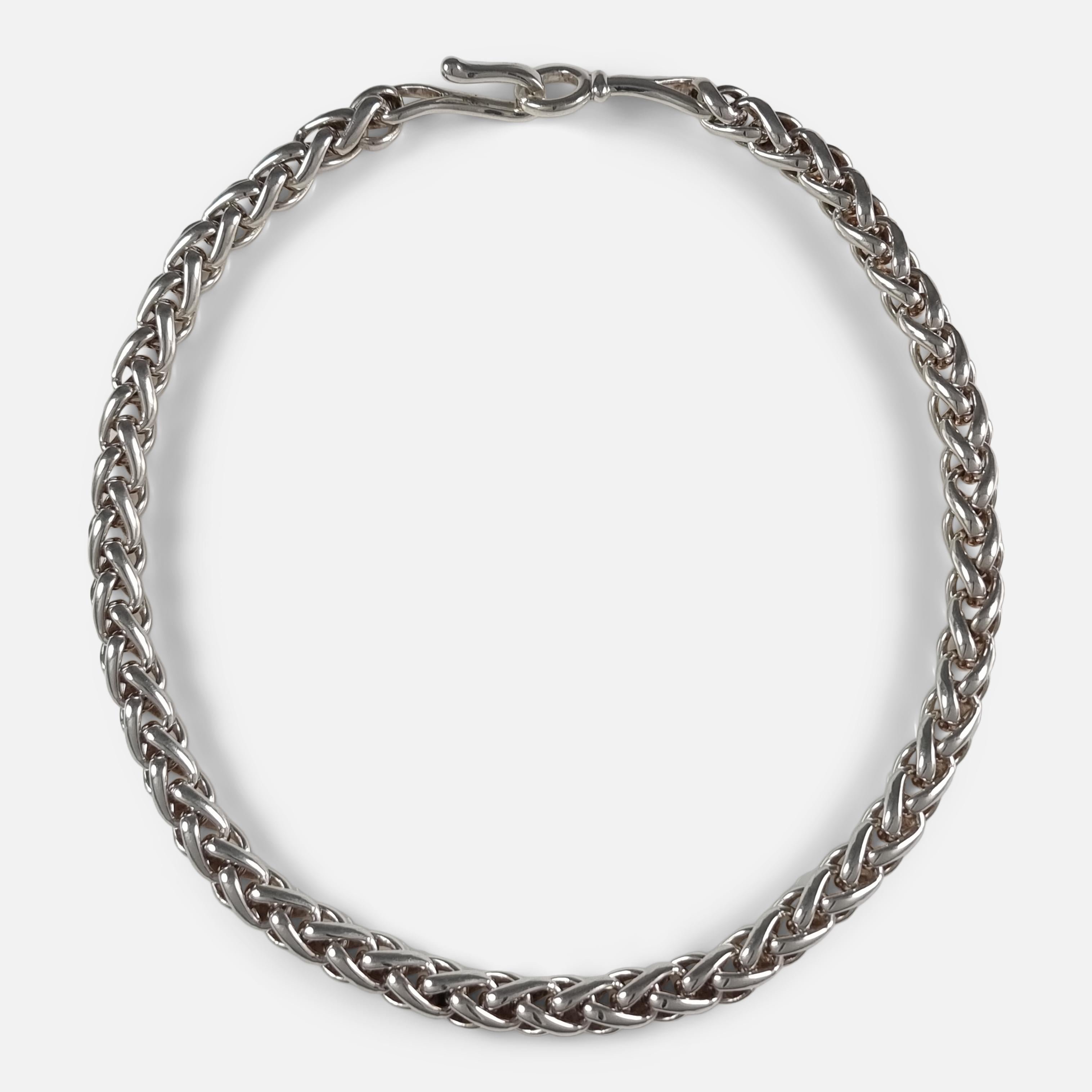 A Danish sterling silver necklace #294, designed by Vivianna Torun Bülow-Hübe for Georg Jensen. 

The necklace is stamped with the Georg Jensen within a dotted oval marking (used since 1945), '925 S', 'Torun', and design number '294'.  The necklace