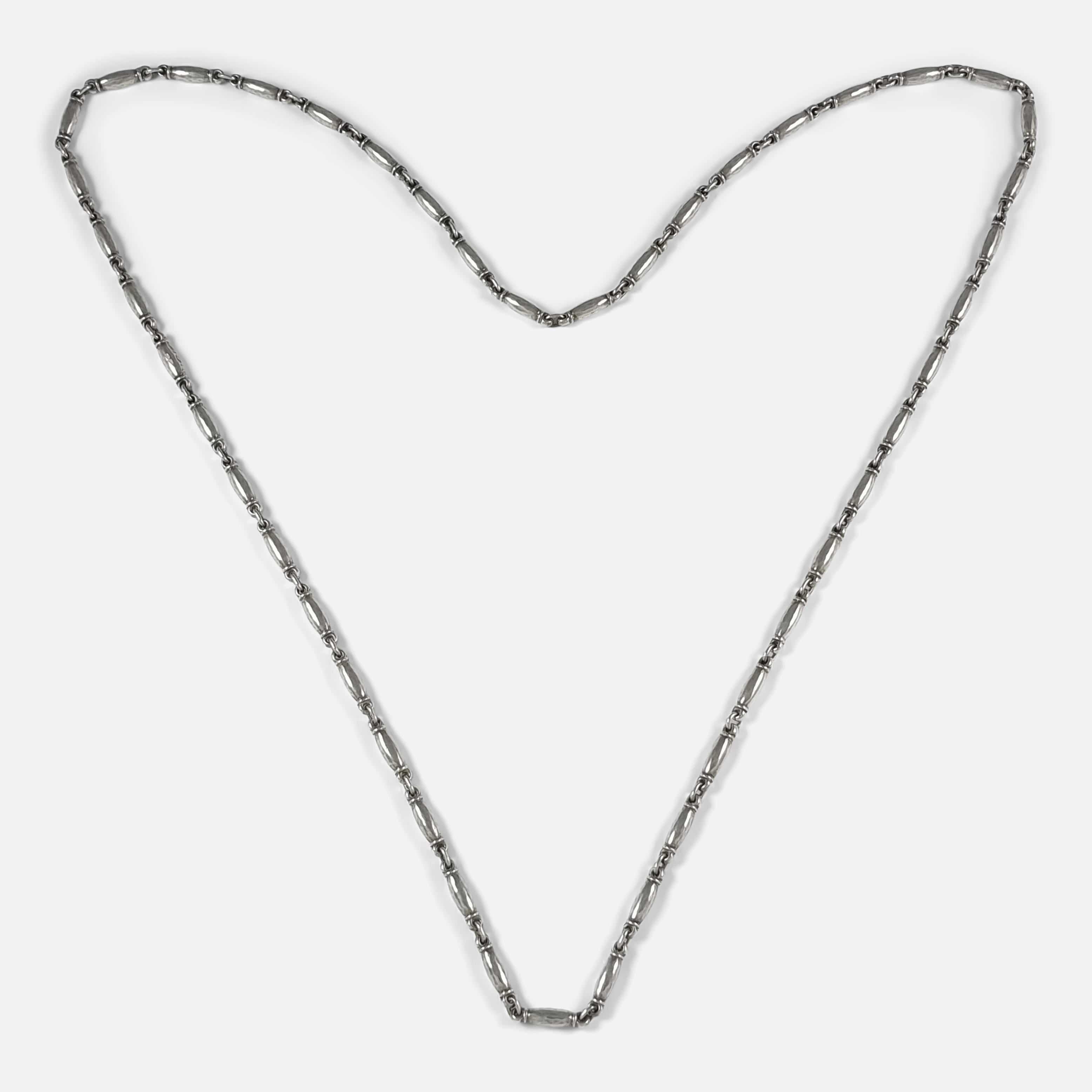 A Danish sterling silver necklace, #40, designed by Henry Pilstrup for Georg Jensen. 

The necklace is stamped with the Georg Jensen within a dotted oval marking (used since 1945), 