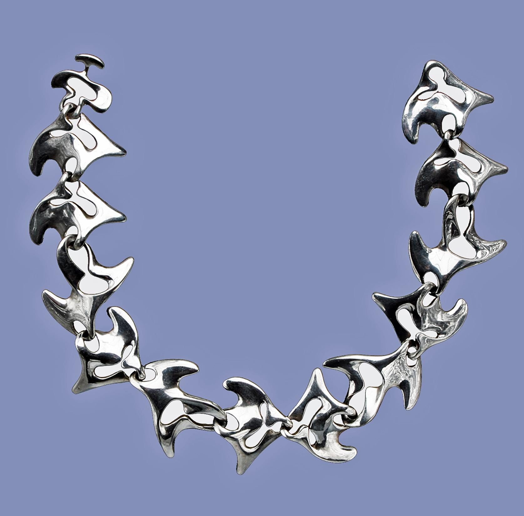Georg Jensen Sterling Silver Necklace, Amoeba #89. Designed by Henning Koppel 1918 - 1981. Stamped with post 1945 Hallmarks dotted oval Georg Jensen, Sterling, Denmark, 89. Width: 4.5 cm. 1.8 inches. L. 43.18 cm. 17.0 inches. Item Weight: 257 grams.