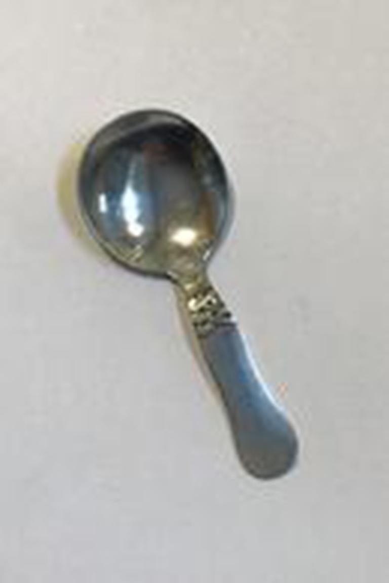 Georg Jensen sterling silver Nordic sugar spoon No 171 

Measures 10.3 cm(4 1/16 in).
