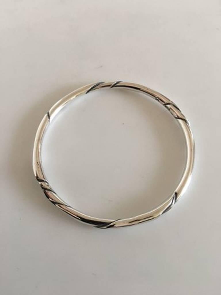 Georg Jensen Sterling Silver Ole Kortzau Bracelet #333. Measures 6.3 cm / 2 31/64 in. inner diameter. Weighs 24 grams / 0.85 oz.