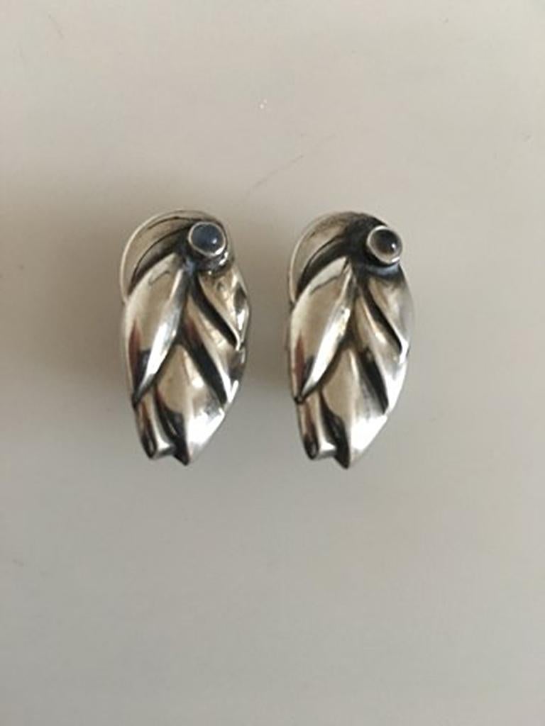 Georg Jensen Sterling Silver Ole Kortzau Earrings No 360 with Moonstones. Earclips. Measures 2.5 cm / 0 63/64 in. Combined weight of 12 g / 0.40 oz. From after 1945.