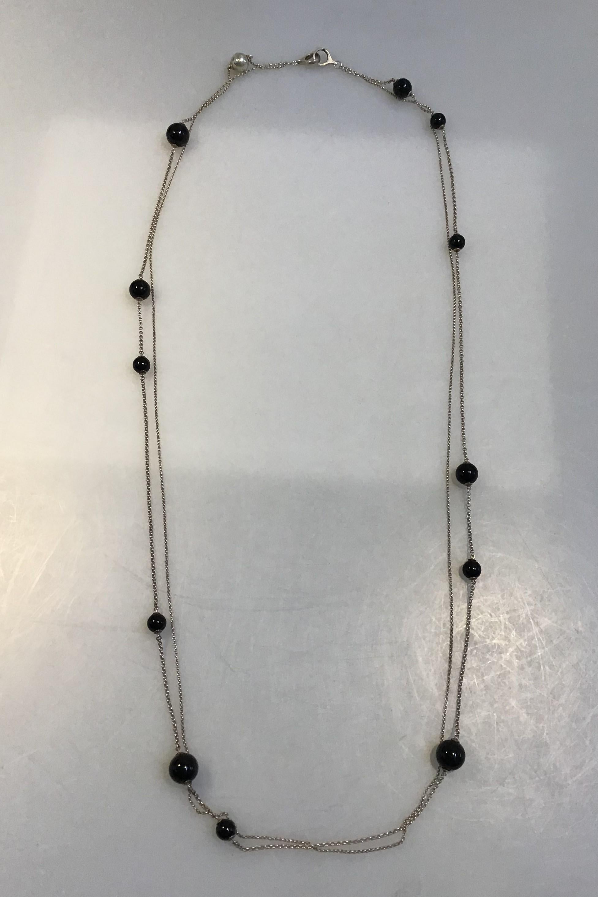 Georg Jensen Sterling Silver & Onyx 2 Strand Chain Bead Necklace 

Measures 100 cm(39.37 in) 
Weight 34.3 gr/1.21 oz