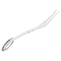 Georg Jensen Tenedor ornamental para limones de plata de ley