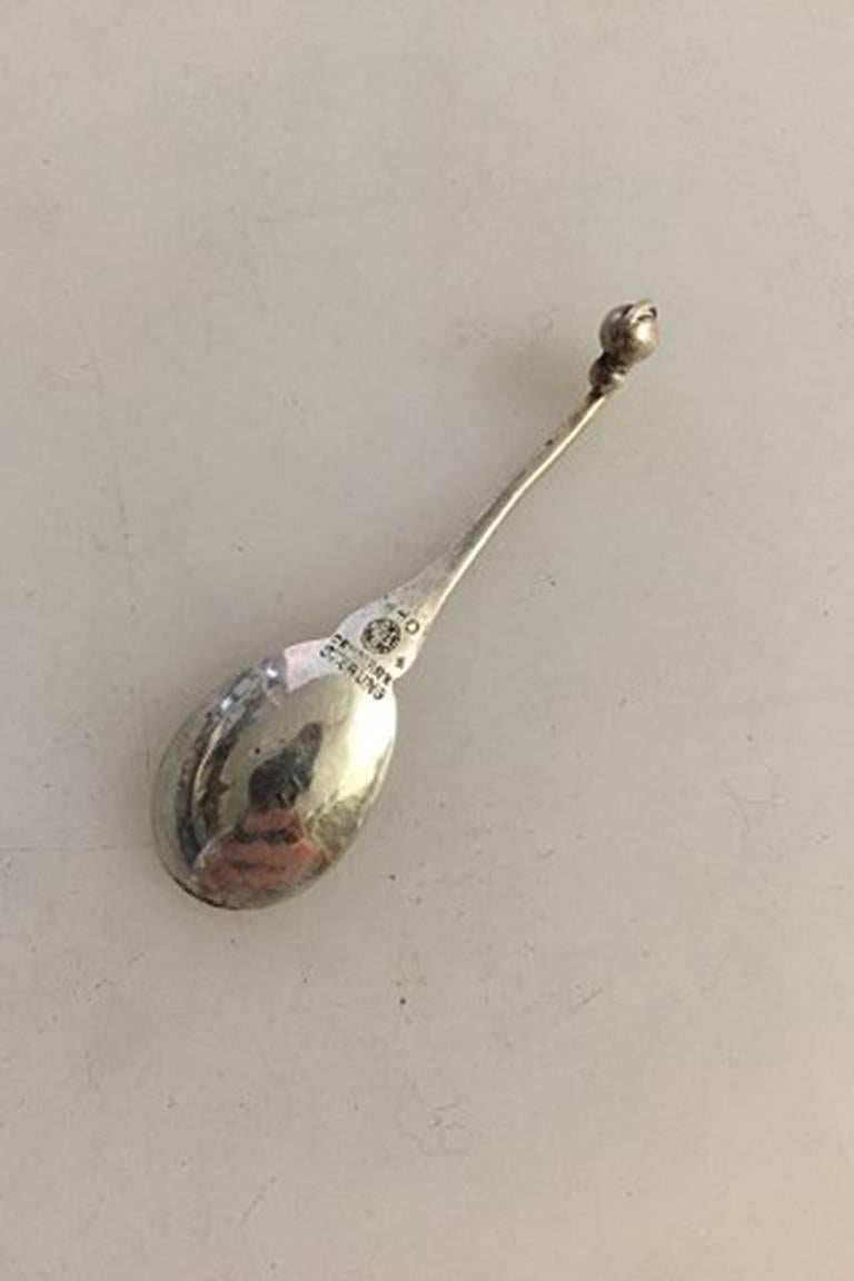 Georg Jensen Sterling Silver Ornamental Salt Spoon #110. Measures 6 cm (2 23/64 in.). From the 1920's.
