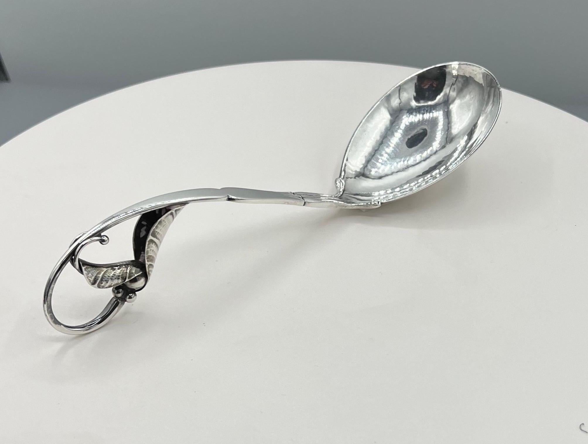 Polished Georg Jensen Sterling Silver Ornamental Serving Spoon #141 For Sale