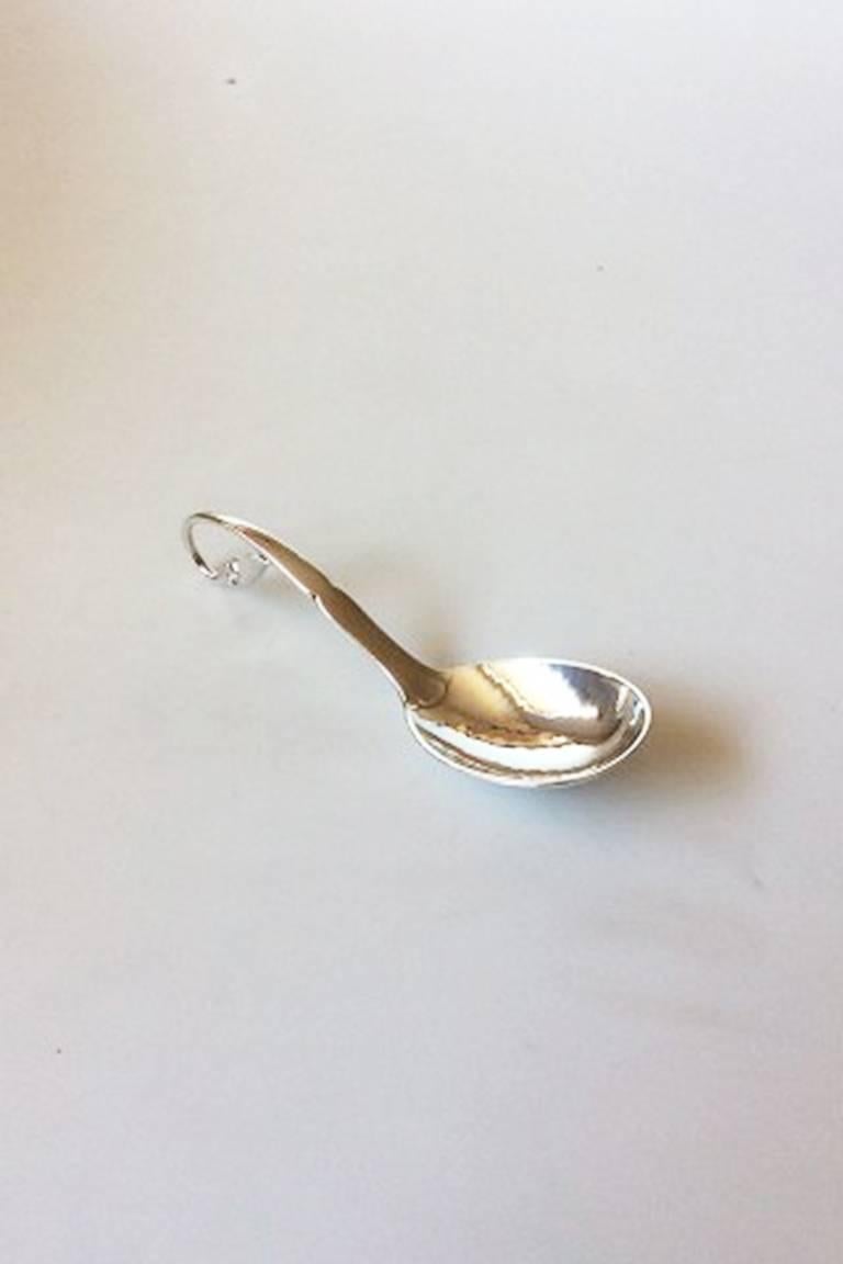 Georg Jensen sterling silver ornamental sugar spoon #21. Measures 13.5 cm / 5 5/16 in.