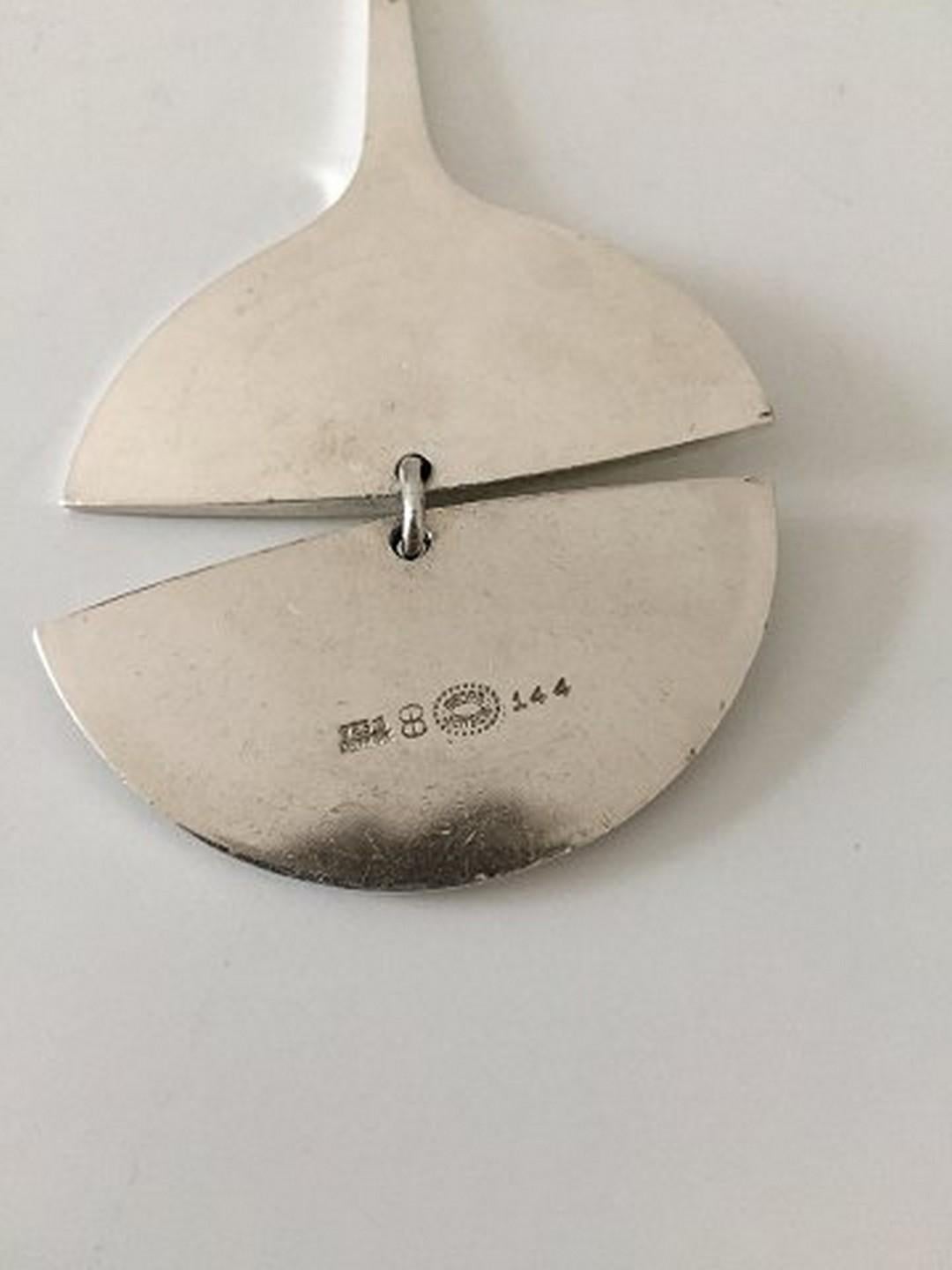 Georg Jensen Sterling Silver Pendant by Bent Gabrielsen No 144. Measures 9.8 cm. Weighs 45.5 g / 1.60 oz.
