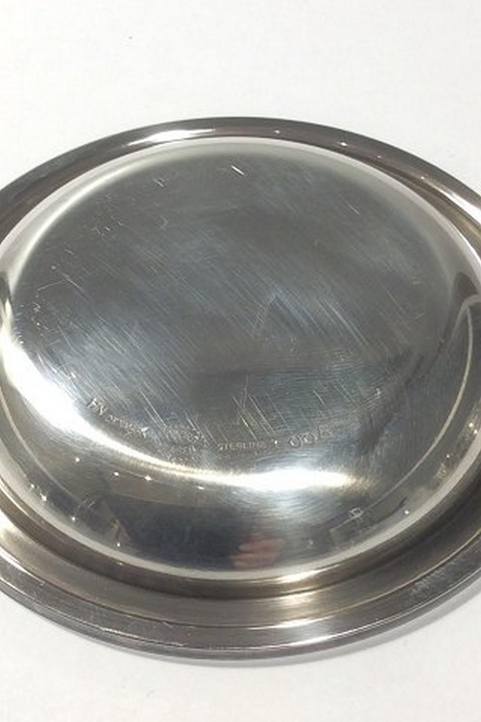 Georg Jensen sterling silver pyramid glass coaster or nut dish 600 A.

Measures: 9cm / 3.54