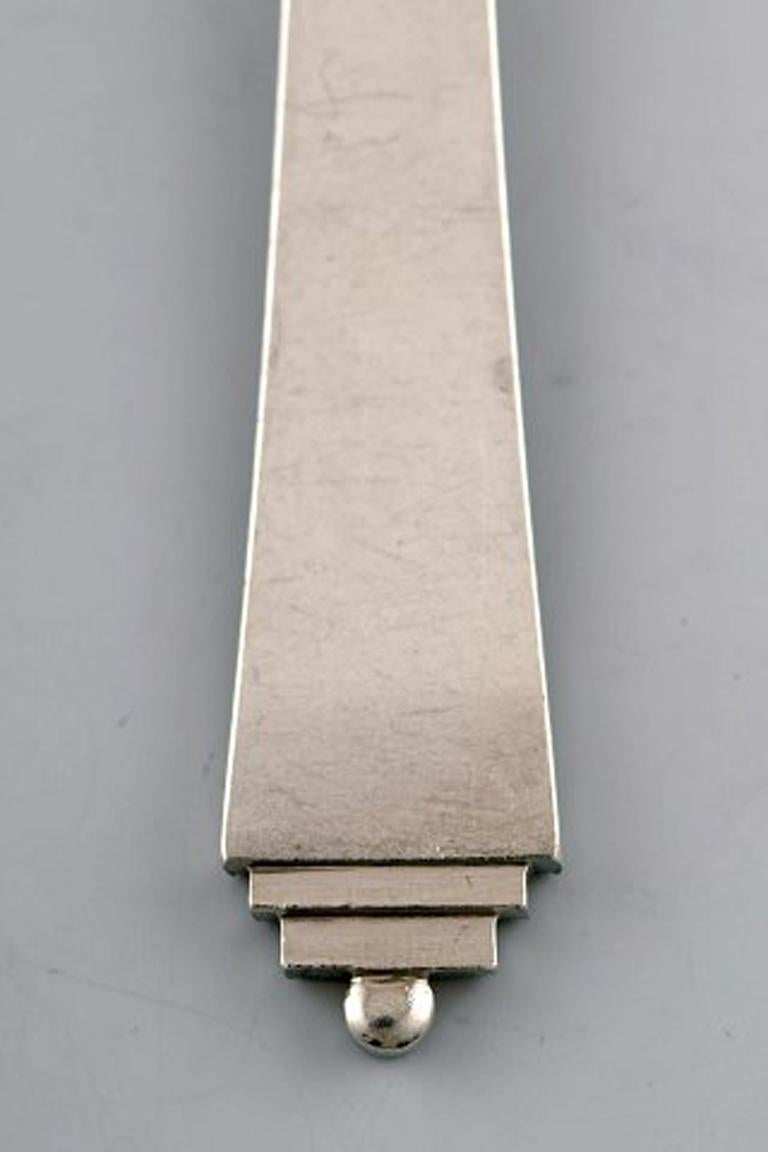 Georg Jensen sterling silver pyramid meat fork.
Measures: 20.5 cm.
Designed by Harald Nielsen 1933-44.
In perfect condition.
Stamped.