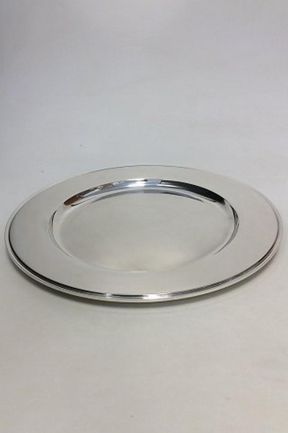 Georg Jensen sterling silver pyramid round tray no 600 M.

Designed by Harald Nielsen

Measures 40cm / 15 5/8
