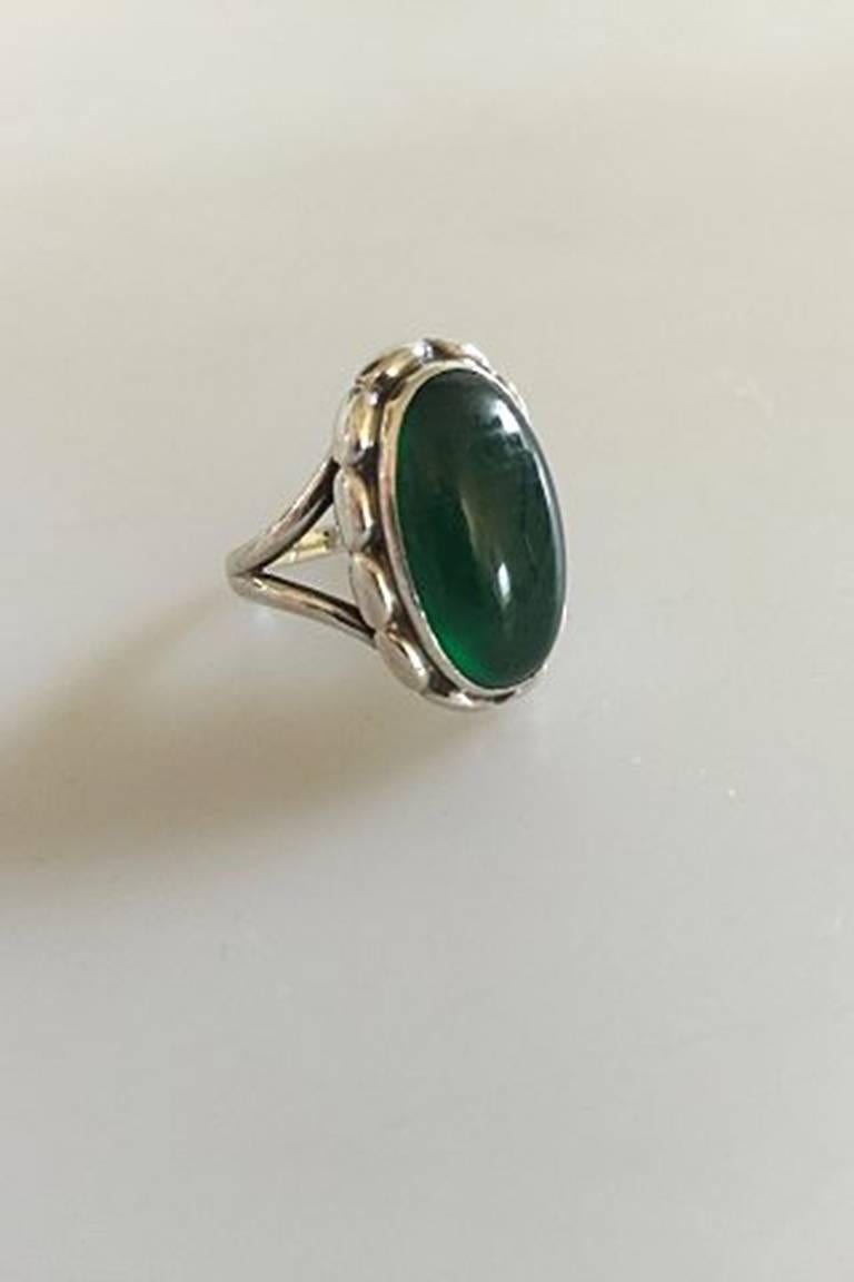 Georg Jensen Sterling Silver Ring No 19 with Clear Green Agate . From after 1945. Ring Size 54 / US 6 3/4. Stone measures 2 cm / 0 25/32 in. x 1 cm / 0 25/64 in. 
Weighs 7 g / 0.23 oz