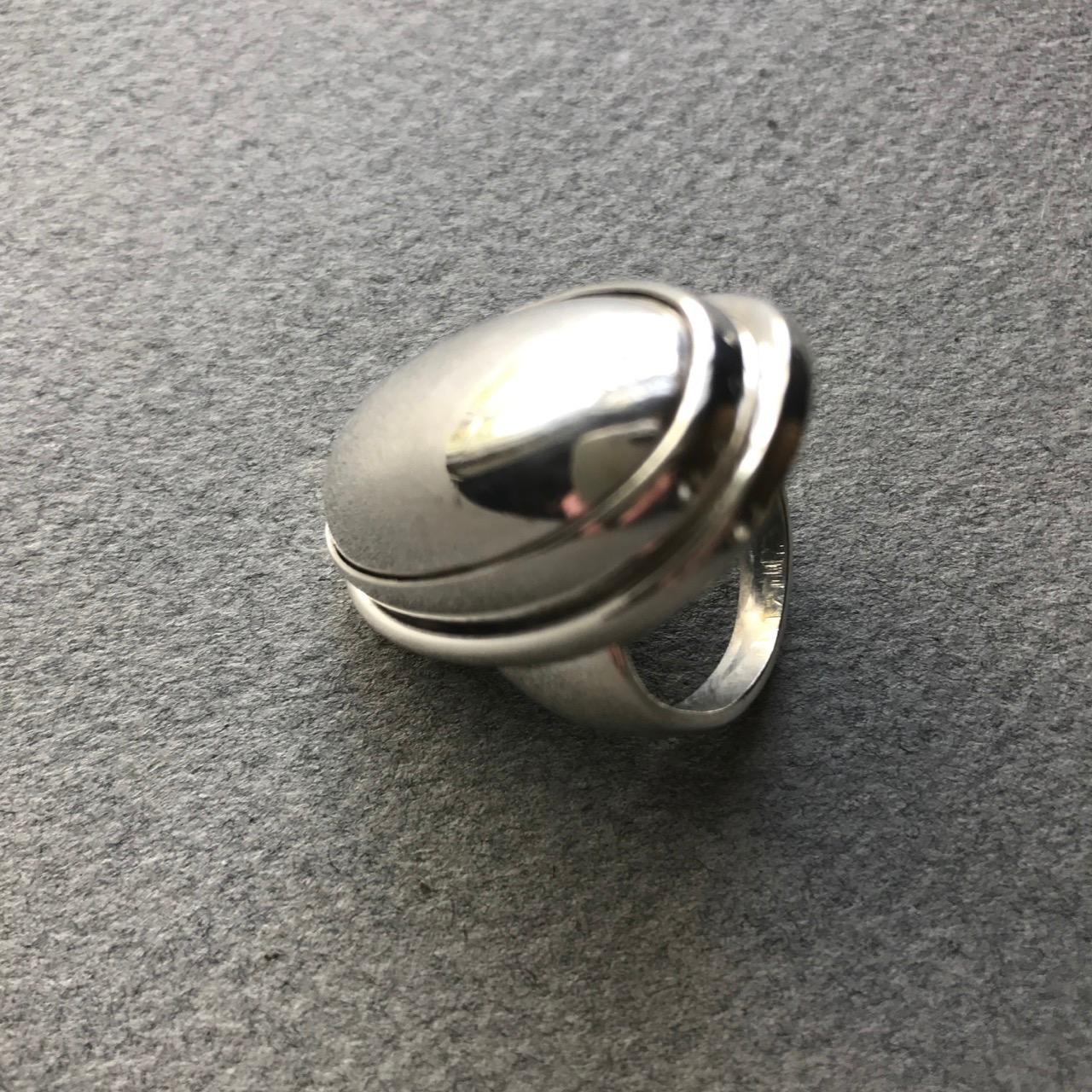 Georg Jensen Sterling Silver Ring No. 46E by Harald Nielsen.
This is the largest size of this design.
Face of ring: 1.25