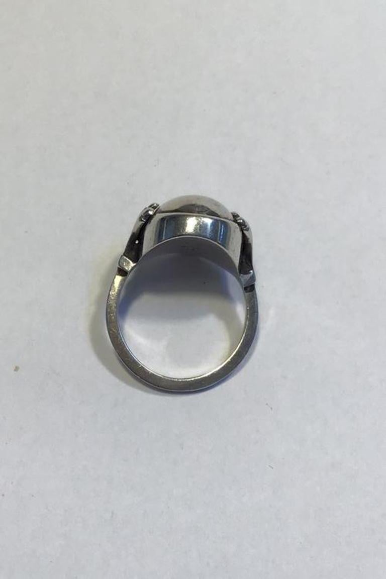 Georg Jensen sterling silver ring no 51 silver stone.

Ring Size 58 (US 8 1/4) Weight 9.5 gr / 0.34 oz.
