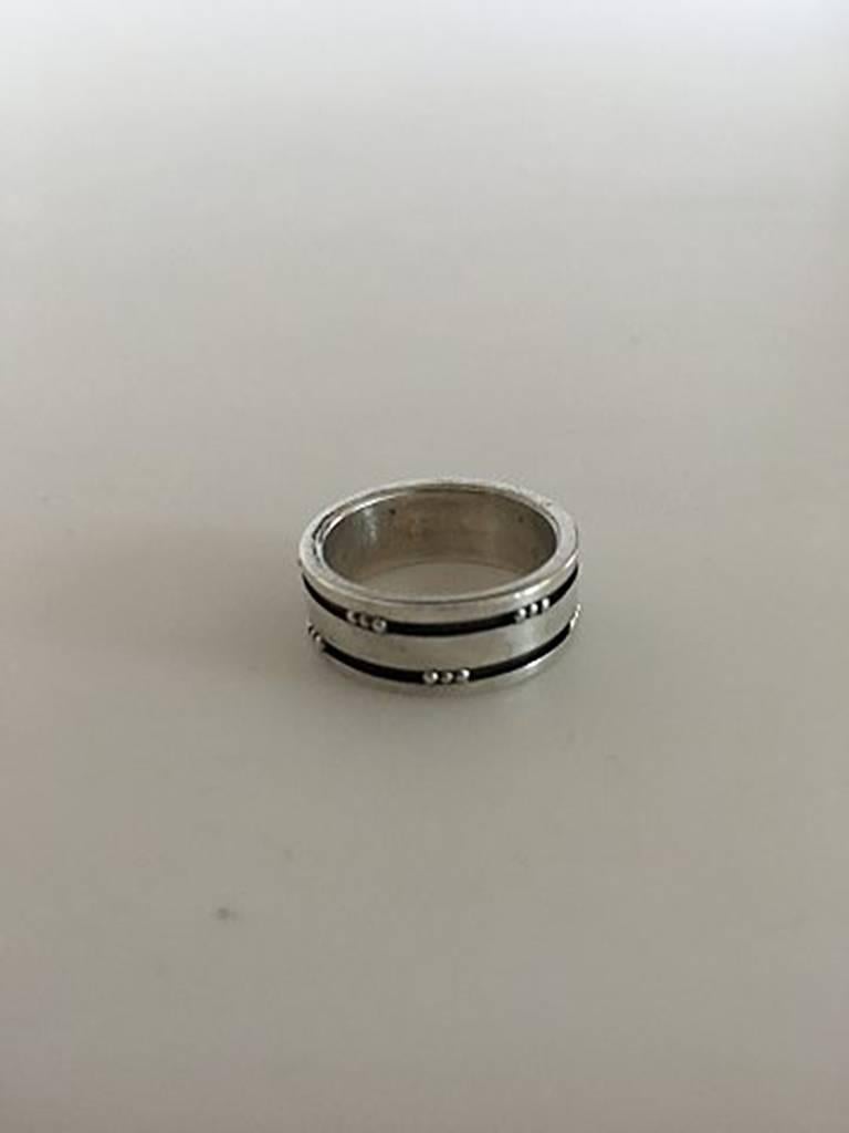 Georg Jensen Sterling Silver Ring No 80D. Ring Size 51 / US 5 1/2. Measures 7 mm wide. Weighs 6 g / 0.21 oz.