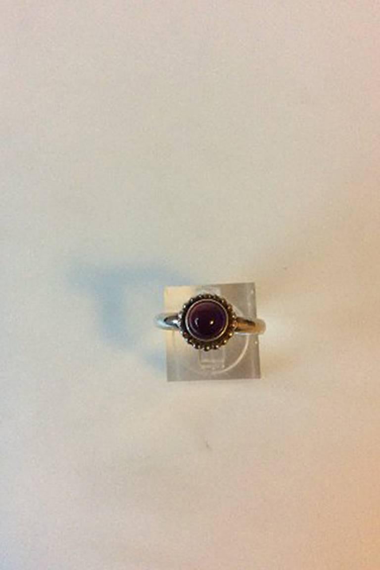 Georg Jensen Sterling Solver Ring No 9B Moonlight Blossom with Purple Stone. Ring Size 54 /US 6 1/2. Weighs 3 g / 0.11 oz.