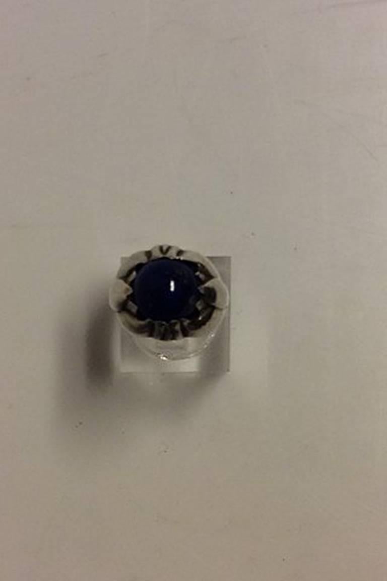 Georg Jensen Sterling Silver Ring with Lapis Lazuli from 1933-1944 N.59.
Ring Size 48 / US 4 1/2.
Weighs 5.2 g / 0.19 oz.