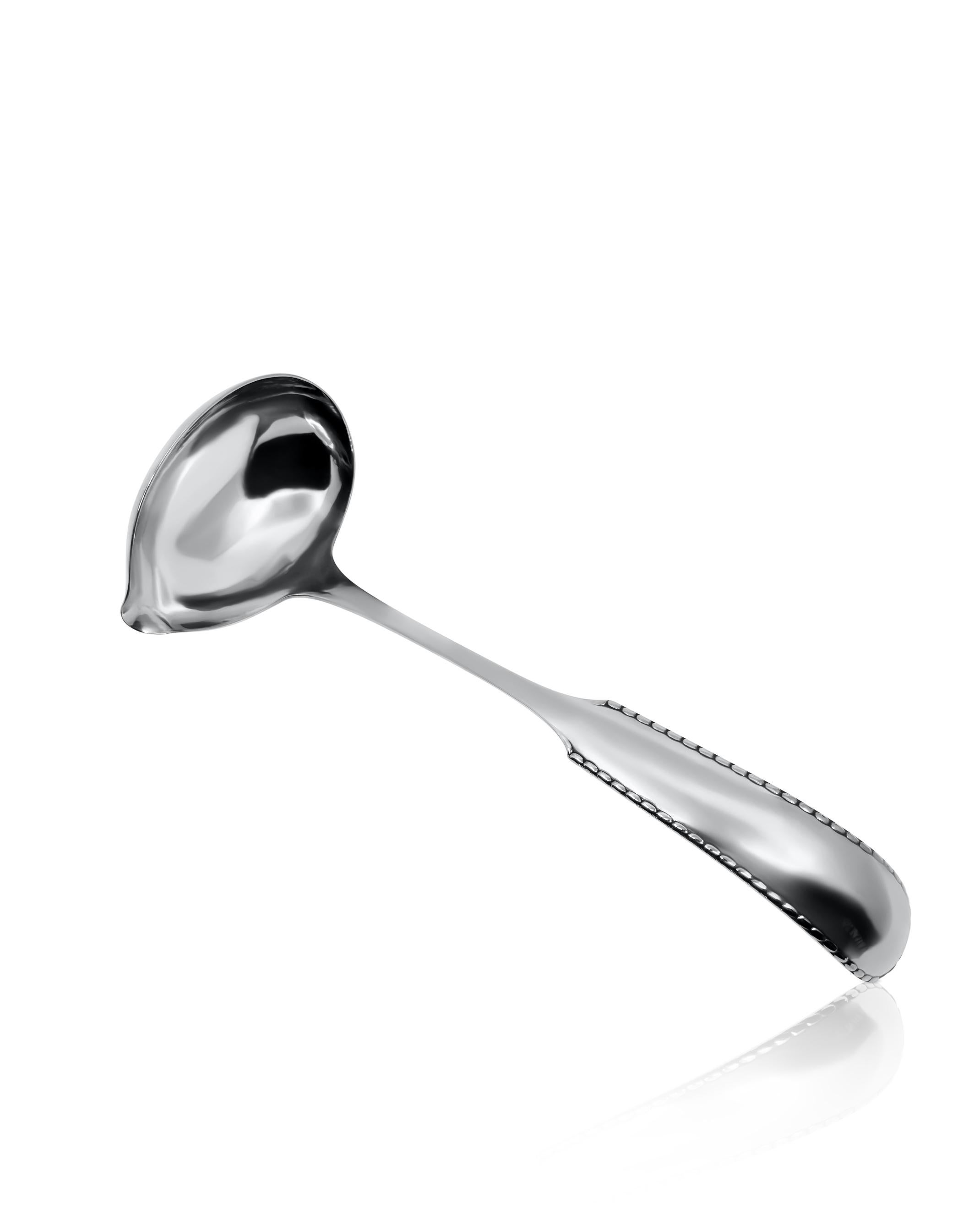 an oversized punch ladle from Georg Jensen crafted in 830 sterling silver, adorned with the iconic Rope/Perle pattern, marked as #151. This substantial ladle boasts meticulous hand-hammered construction, featuring a hand-forged spout. The gracefully