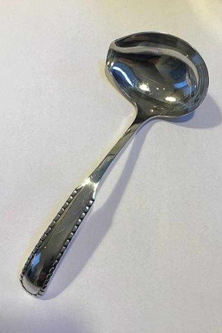 Georg Jensen sterling silver rope sauce ladle No 153A.

Measures 18.5 cm (7 9/32 in).