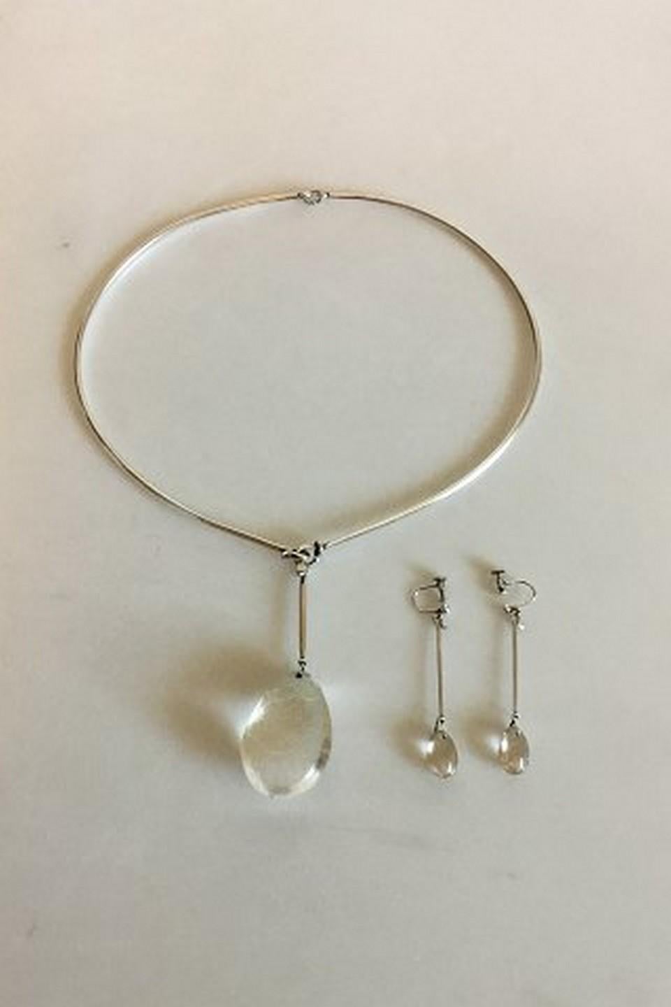 Modern Georg Jensen Sterling Silver Set Consisting of Neck Ring No 114 and Earrings For Sale