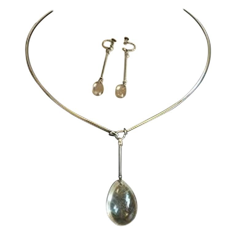 Georg Jensen Sterling Silver Set Consisting of Neck Ring No 114 and Earrings For Sale