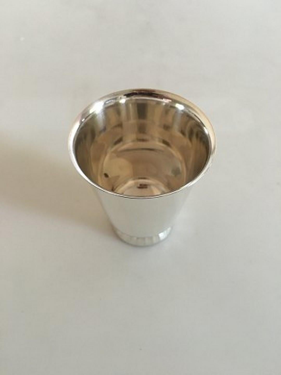 Georg Jensen sterling silver Sigvard Bernadotte cup. From after 1945. In perfect condition. Measures 6.2 cm tall (2 7/16
