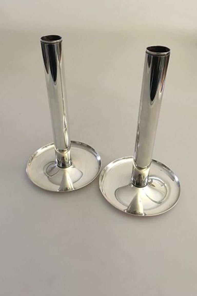 Georg Jensen sterling silver Soren Georg Jensen pair of candlesticks #1138A. From after 1945. 
Measures: 18 cm H (7 3/32 in). Foot measures 11 cm dia (4 21/64 in).
