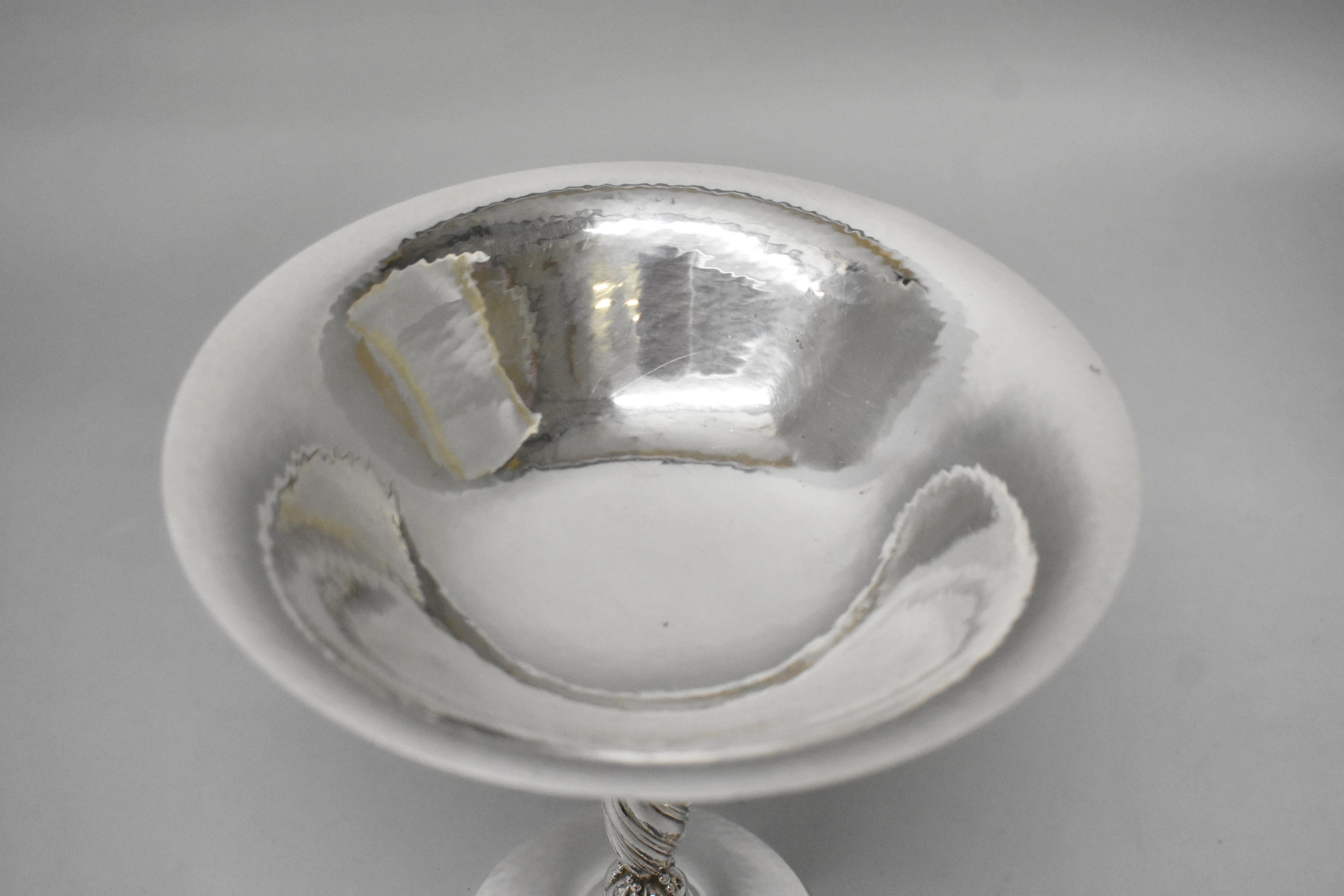 Beautiful sterling Tazza compote in grape motif by Georg Jensen, circa 1918. Marked 263 B.  Very good condition. Dimensions: 7