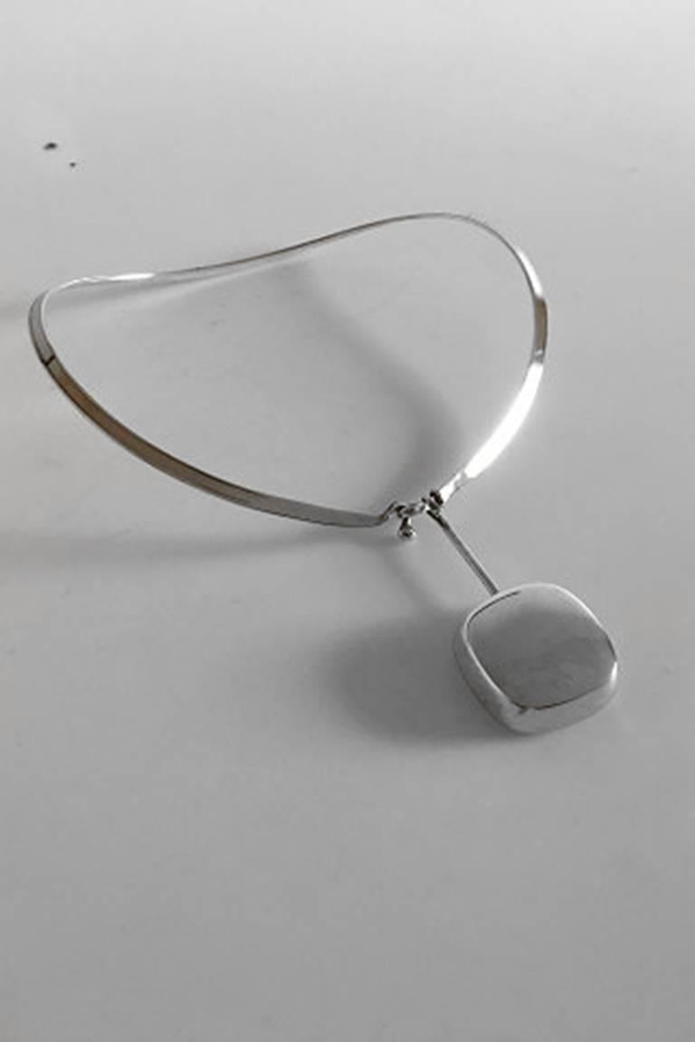 Georg Jensen Sterling Silver Torun Neckring #168 with Pendant #306. Designed by Vivianna Torun Bülow-Hübe. Neckring measures 16.5 x 13.5 cm wide (6 1/2