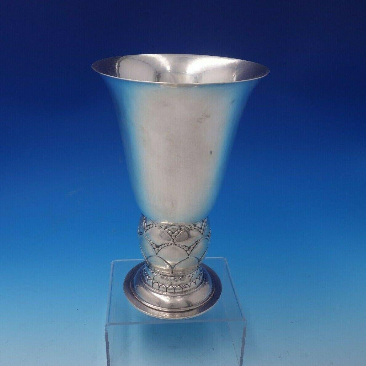 Georg Jensen

Exceptional Georg Jensen sterling silver vase marked #68. This piece measures 8 5/8
