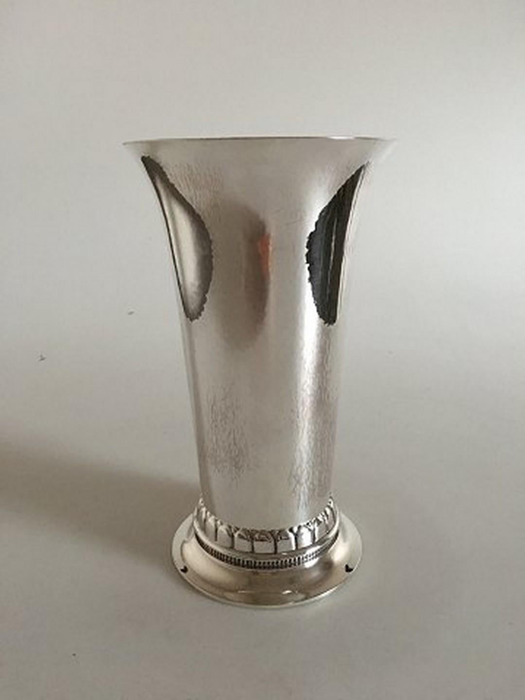 Georg Jensen sterling silver vase no. 115A.
Measures: 20 cm / 7 7/8 in.
Weighs: 485 g / 17.10 oz.
In perfect condition.
Item no.: 288706.