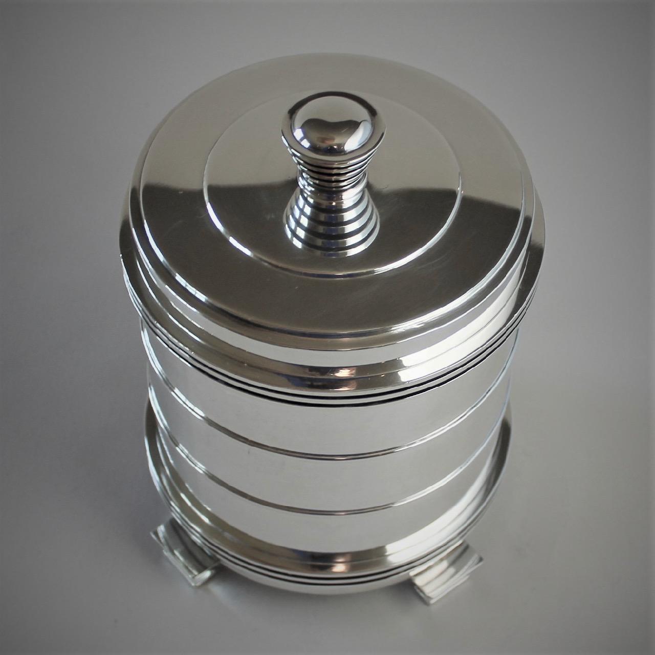 Georg Jensen sterling silver very rare tobacco jar, No.796 by Jorgen Jensen.

Important design defining the art deco period. Design from 1936. Hallmarks of the period.

A similar example can be seen in the book GEORG JENSEN HOLLOWARE, The Silver