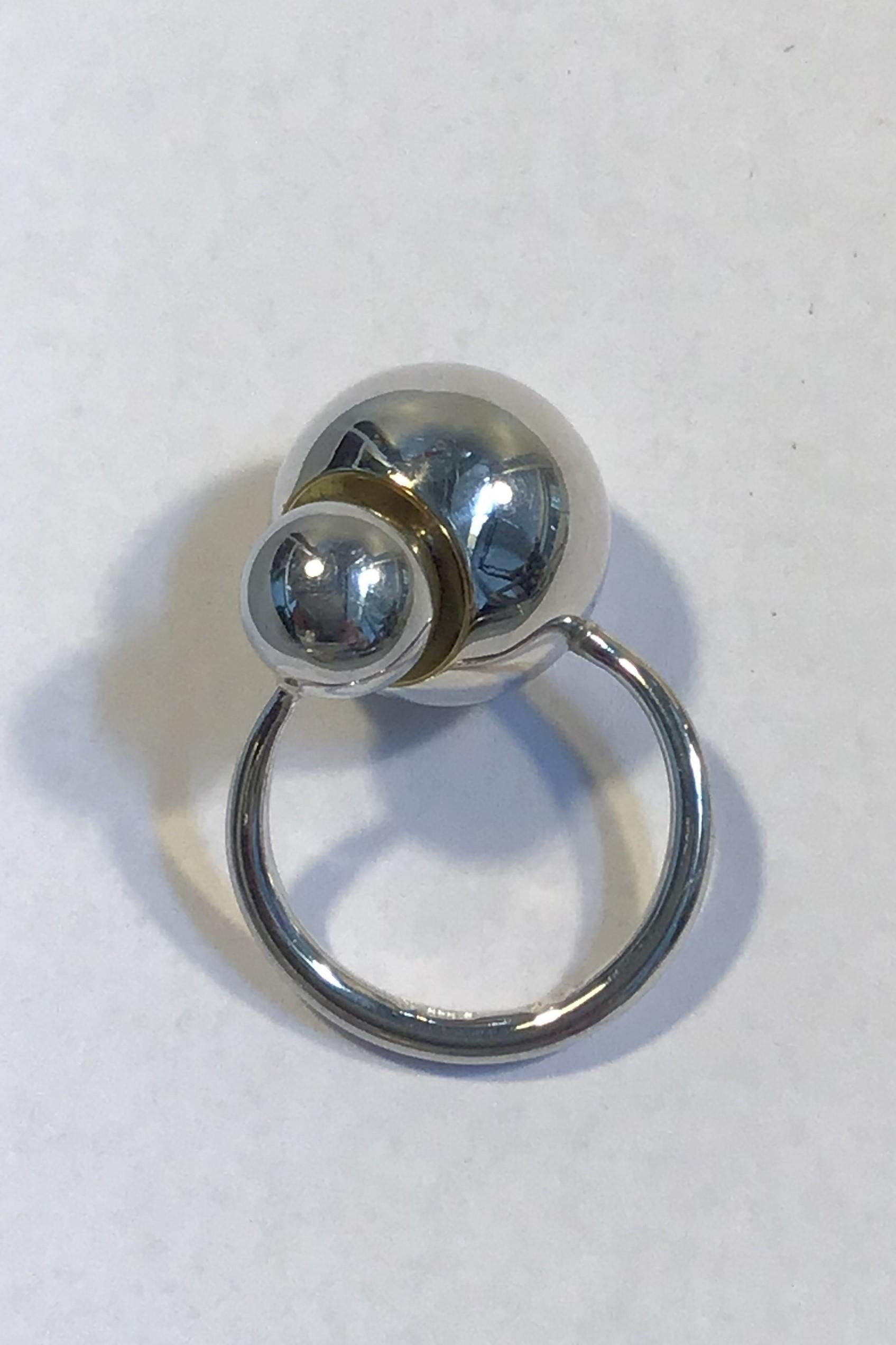 Georg Jensen Sterling Silver with 18 ct Gold. No 509 - Cave Jacqueline Rabun Ring Size 55/US 7 1/4 Weight 12.3 gr/0.43 oz