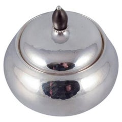 Vintage Georg Jensen sugar bowl in sterling silver with an ebony lid knob. Model 80C.