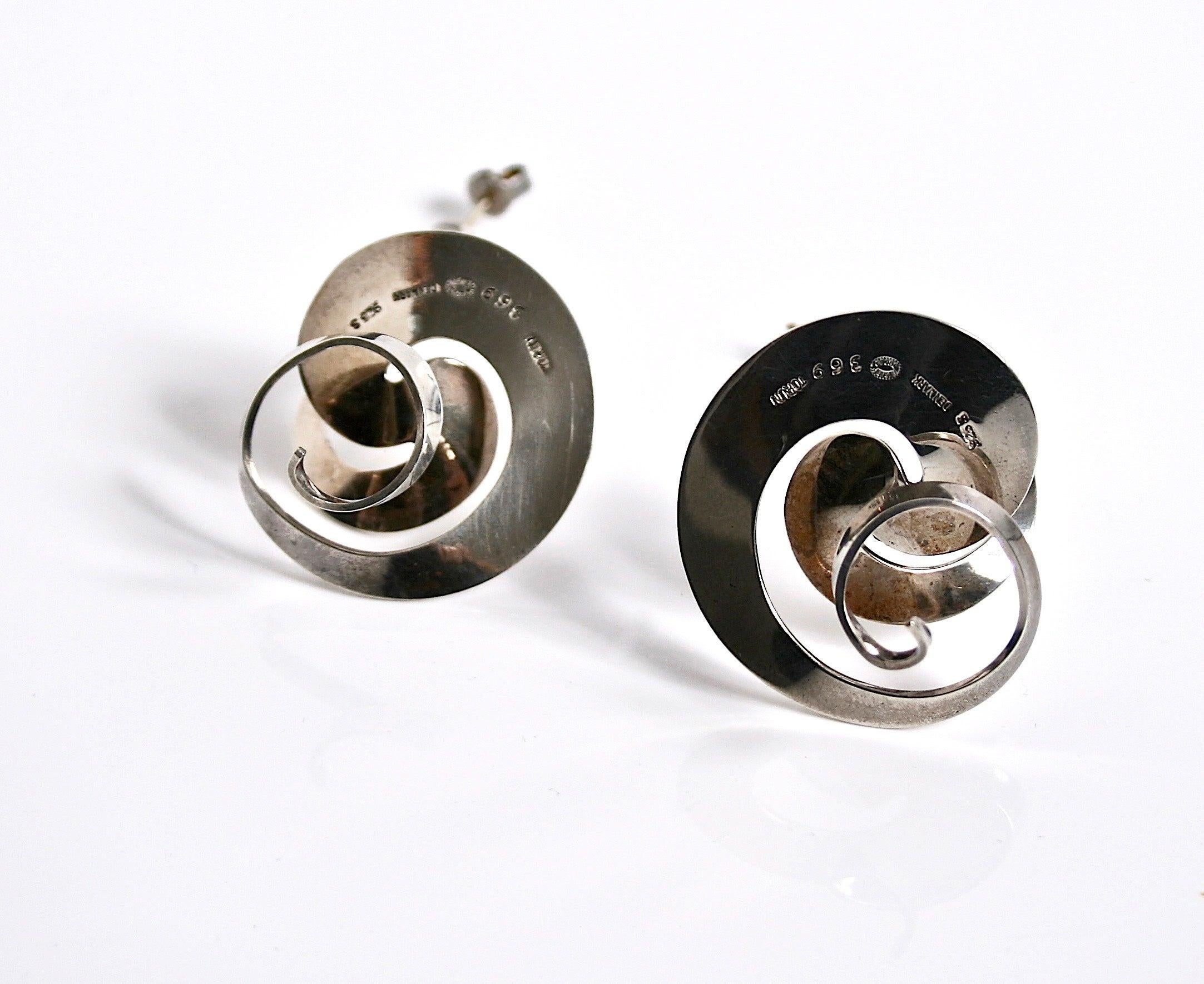 Early vintage Georg Jensen sterling silver swirl earrings designed by Vivianna Torun Bulow-Hube Denmark c.1960 
Design number 369 comes in the original Georg Jensen box
Large scale for pierced ears