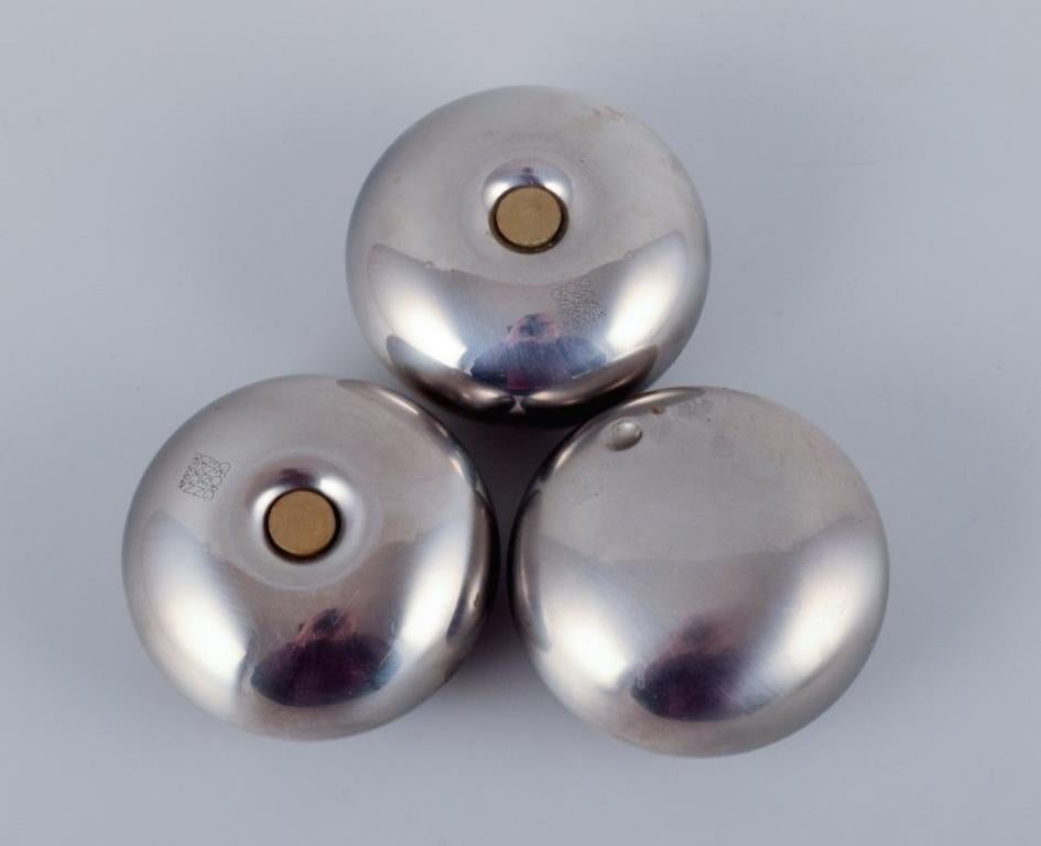 Late 20th Century Georg Jensen, three pieces in stainless steel. Salt & pepper shakers, ashtray.