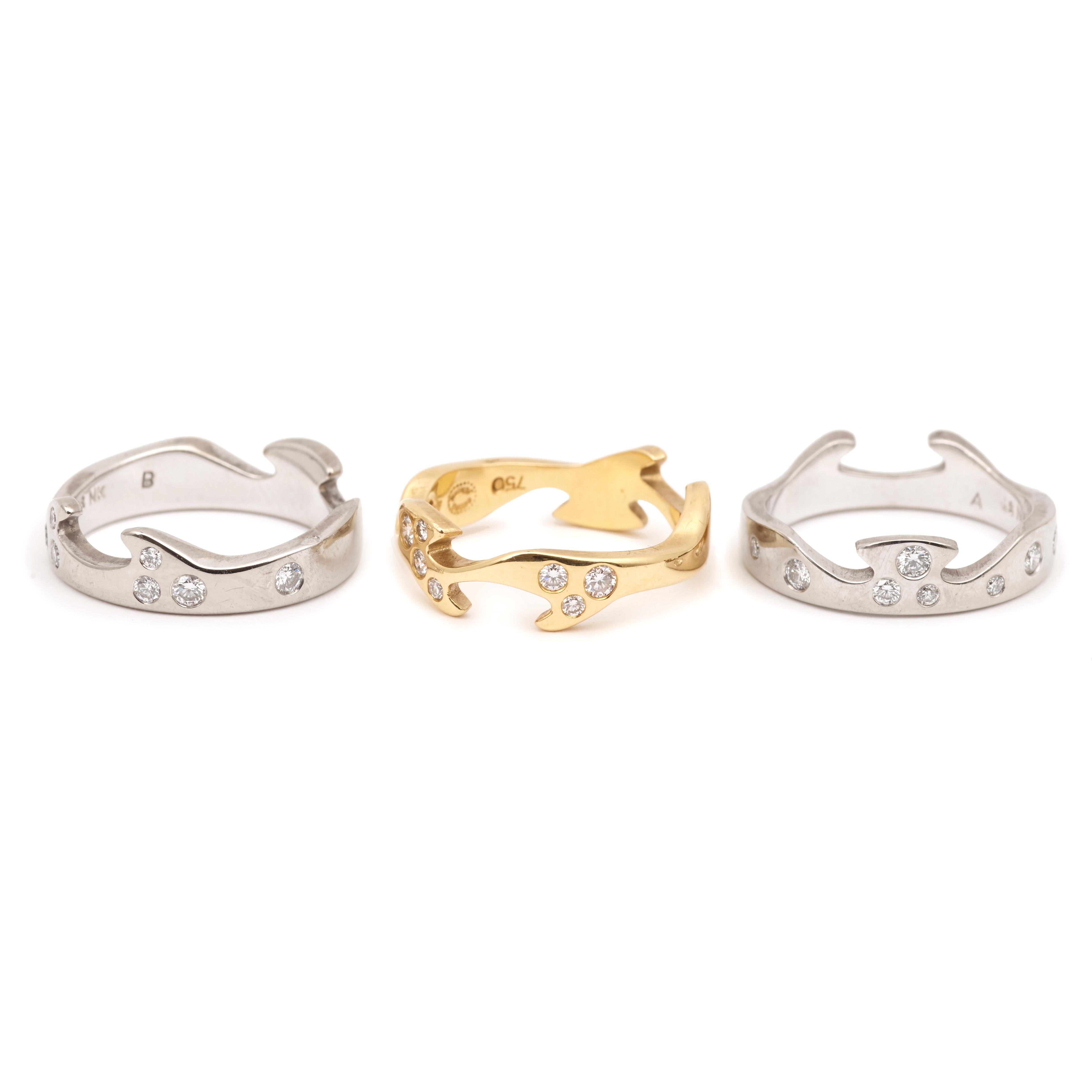 Amazing trilogy of rings called “Fusion” with diamonds signed Georg Jensen.

Two rings in white gold and one in yellow gold, they fit into each other offering a great possibility of combination.
The three rings are paved with diamonds.

Sold in