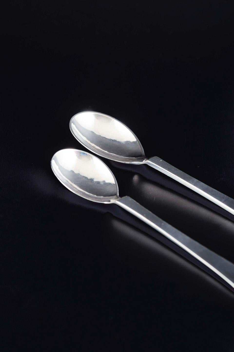 PRE-OWNED GOODS ARE EXEMPT FROM IMPORT TARIFFS FOR U.S., UK, AUSTRALIAN & CANADIAN CUSTOMERS.   
THEREFORE, NO IMPORT TARIFFS WILL BE APPLICABLE TO YOUR PURCHASE. 

Georg Jensen. Two spoons in the “beaded” pattern.
Sterling silver.

Designer: