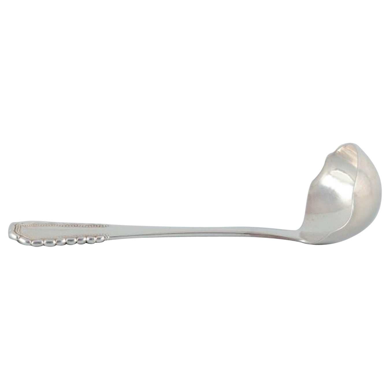 Louche à sauce Viking de Georg Jensen en argent sterling. Avec le Hallmark de 1930.