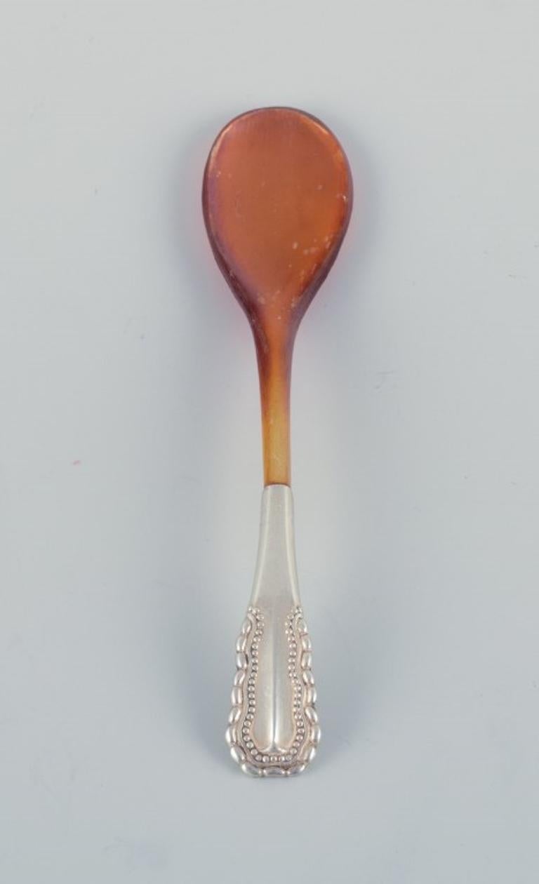 Danish Georg Jensen, Viking, rare salt spoon with amber-colored horn handle.