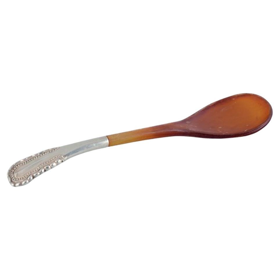 Georg Jensen, Viking, rare salt spoon with amber-colored horn part. For Sale