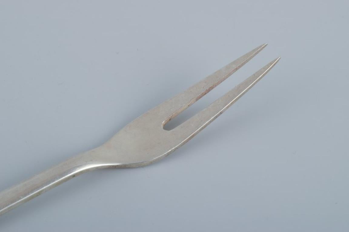 Danish Georg Jensen, Viking, two cold meat forks/herring forks in 830 silver.  For Sale