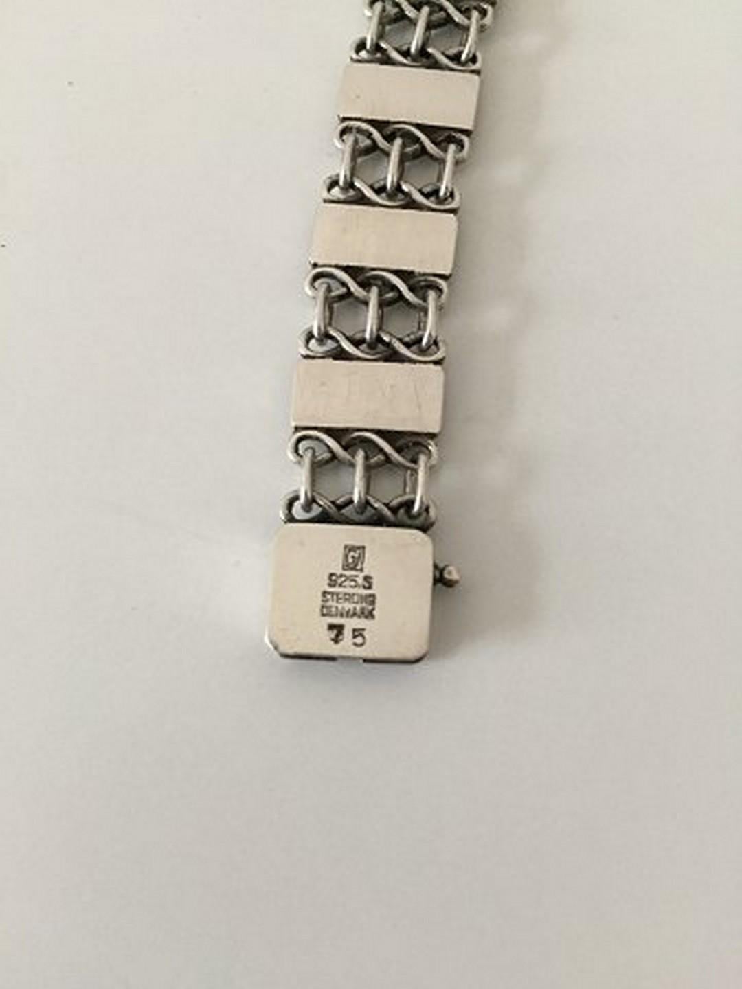 Georg Jensen Vintage Bracelet in Sterling Silver No 75. Measures 18.7 cm / 7 23/64 in. and is in good condition. From 1933-1944. Weighs 26 g / 0.90 oz.