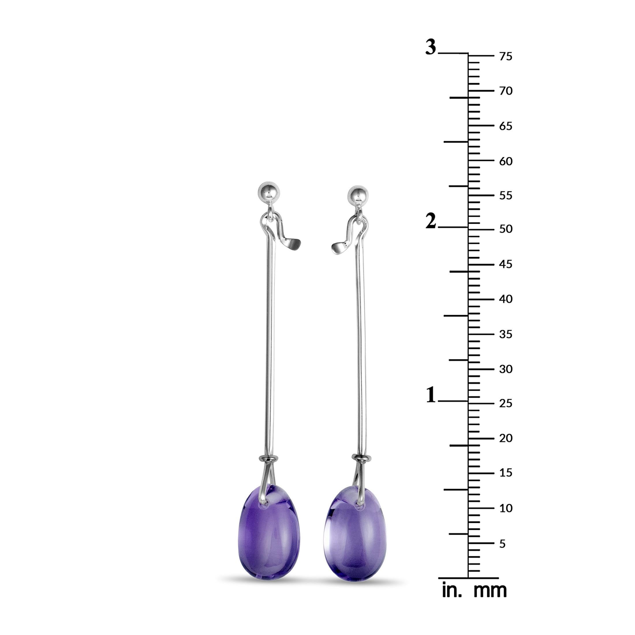 Accentuate your ensembles in a gorgeously feminine fashion with these lovely earrings from Georg Jensen that boast elegant design topped off with enticing amethysts. The pair is beautifully made of silver and each of the two earrings weighs 2.9