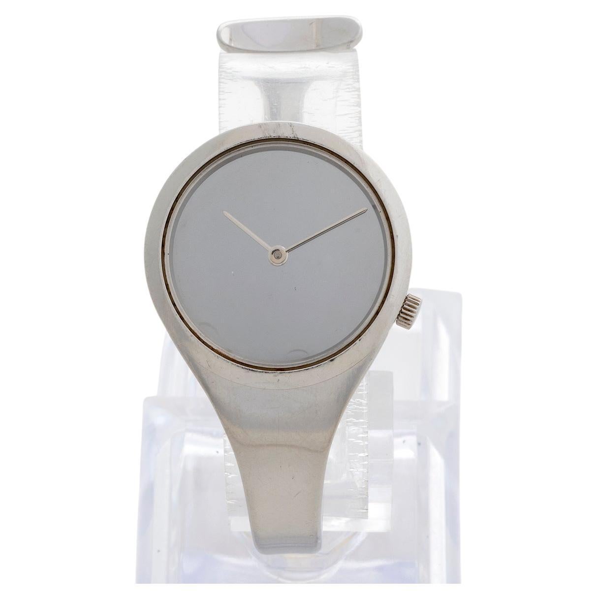 Named after its famous designer, Vivianna Torun Bulow-Hube, the Torun bangle watch is an icon of the Georg Jensen design house and was first launched in 1969. This example features the popular mirror dial, and is a all stainless steel reference 336,