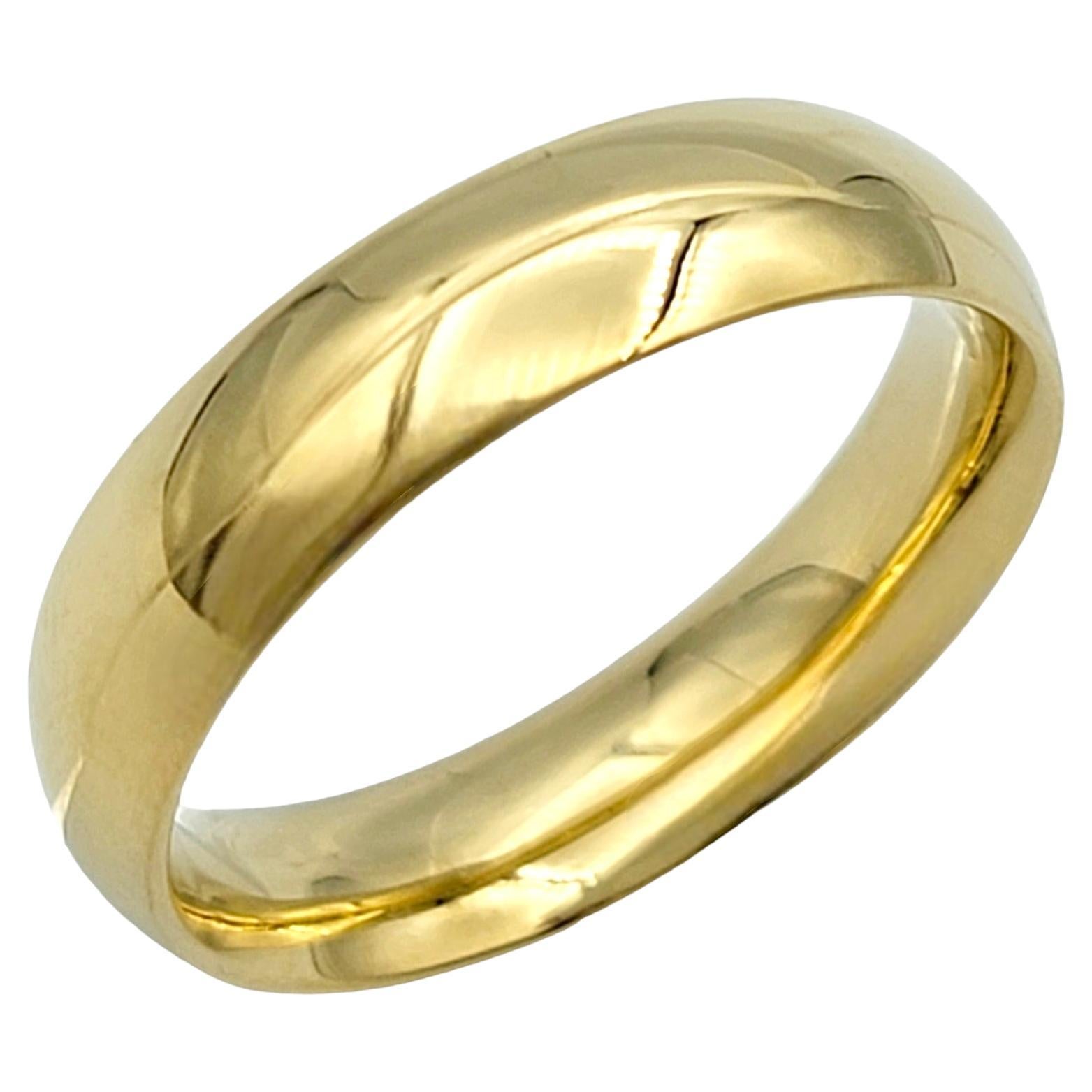Ring Size: 8

This Georg Jensen band ring, crafted from 18 karat yellow gold, radiates timeless elegance with its high-polish finish. The smooth surface of the ring reflects light beautifully, adding a touch of luxury to any ensemble. Its simple yet